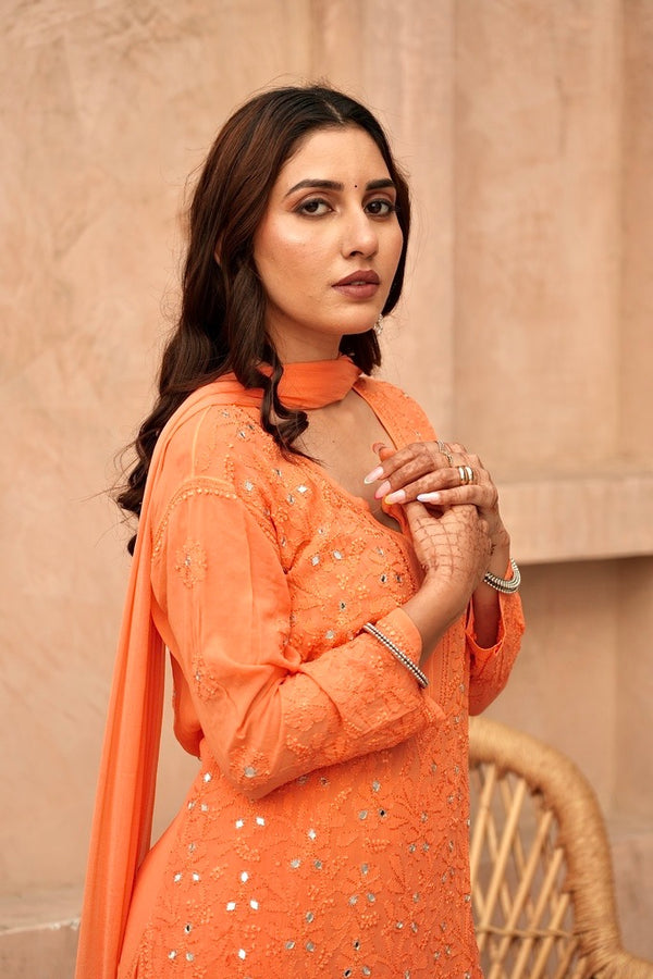 Inara chikankari and mirror work kurti in Orange